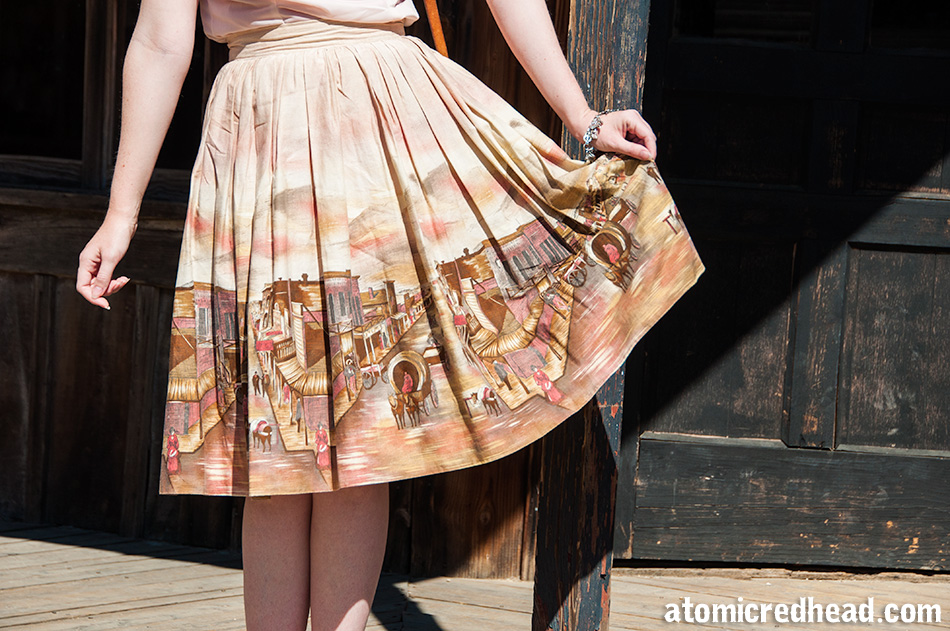 A close up of my skirt, which features a western town.