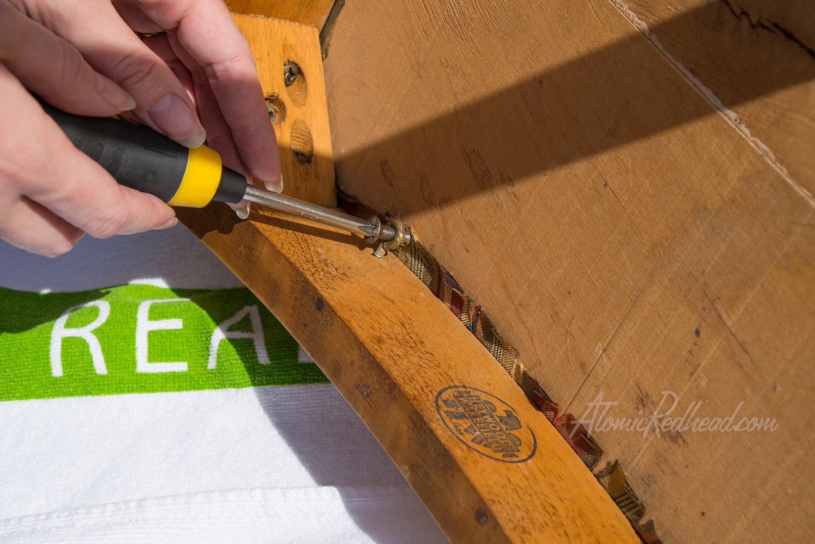 Remove screws so the seat can be separated from the rest of the chair