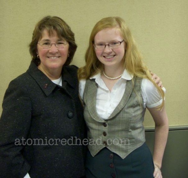 Me with Jan Eliot. 2007 I want to say... Wearing a white blouse with a plaid vest, and dark green skirt, and a strand of pearls.