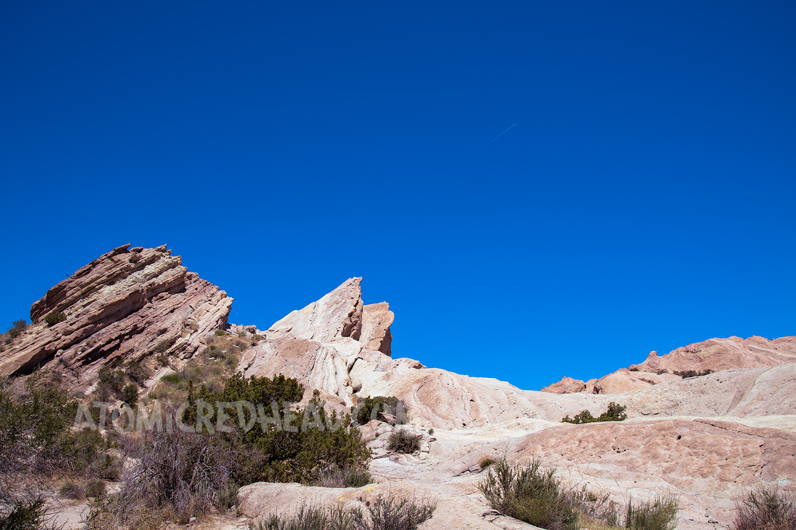 Peaks of Vasquez Rocks against a bright blue sky.