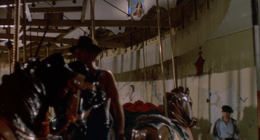 Paul Newman's Henry talks with Billie as she overlooks the carousel from one of the high above windows.