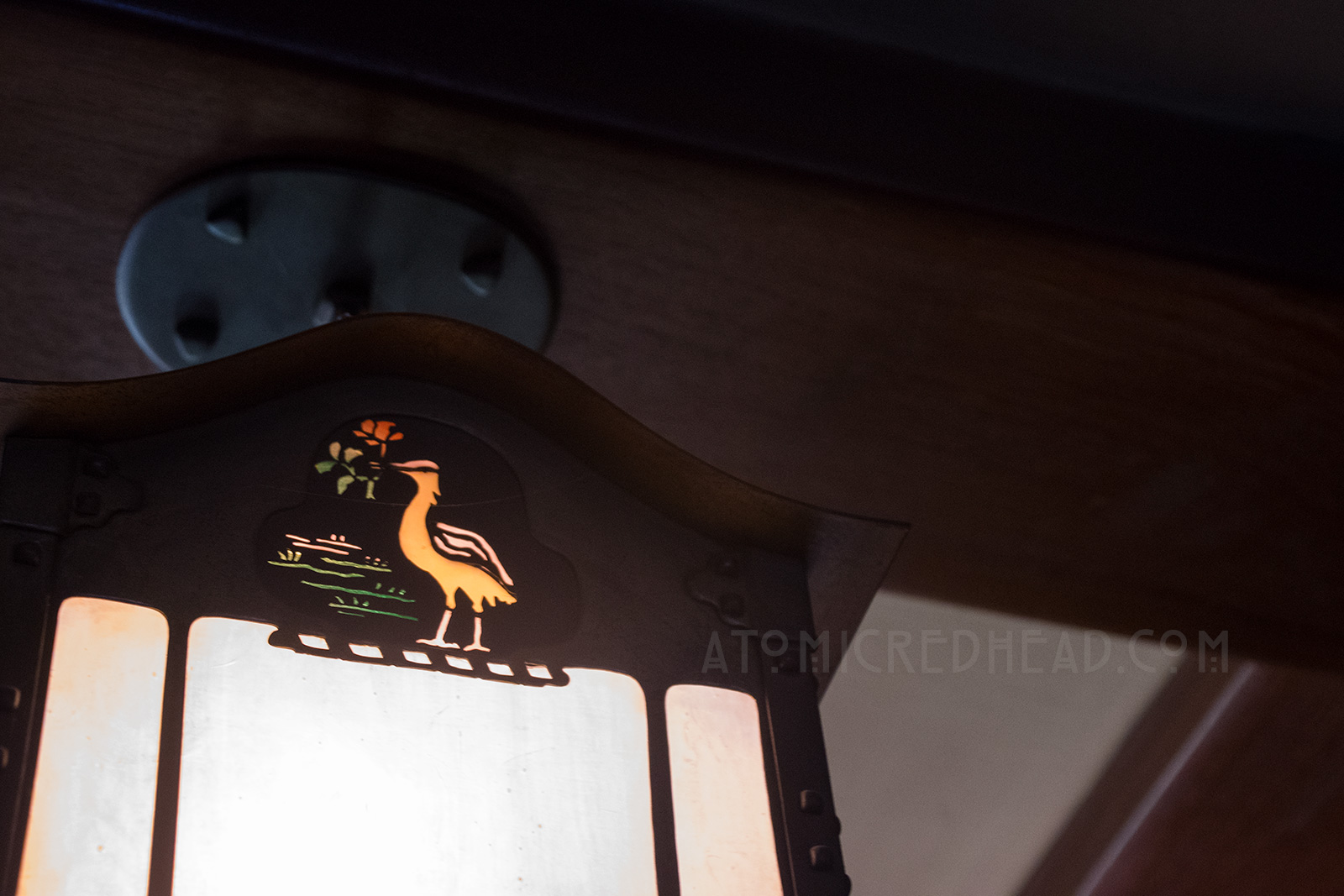 The Gamble family crest, a crane with a rose in its beak, is worked into an interior light fixture.