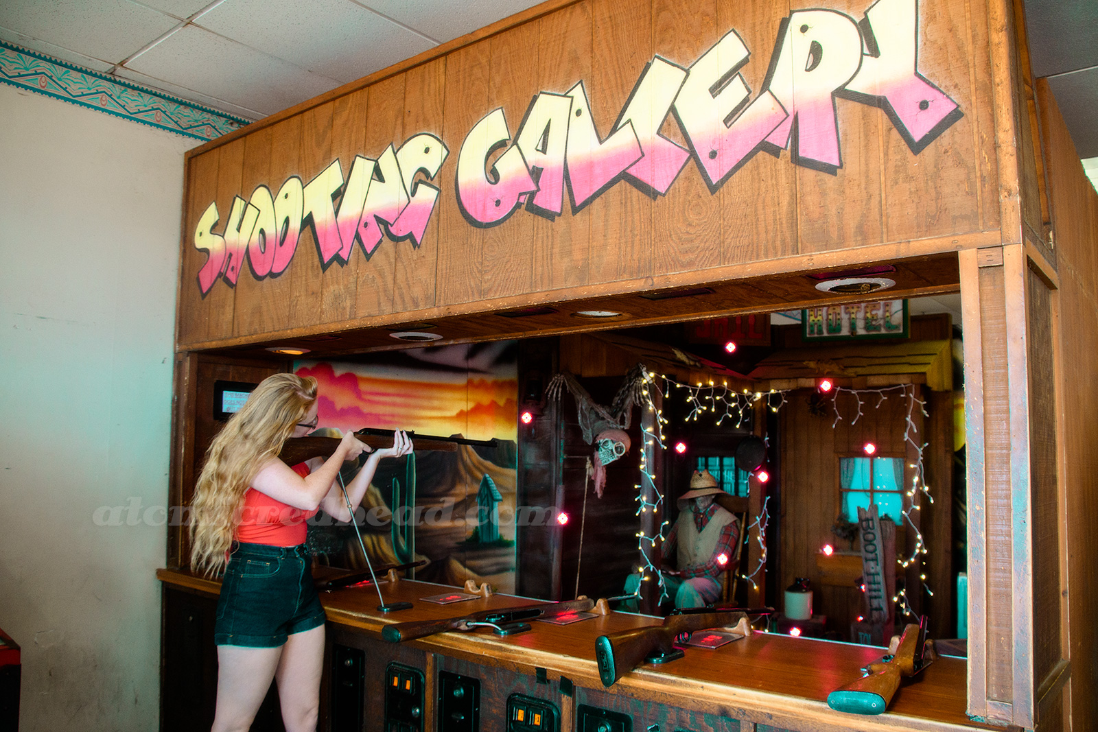 Me at a western themed shooting gallery inside Playland.