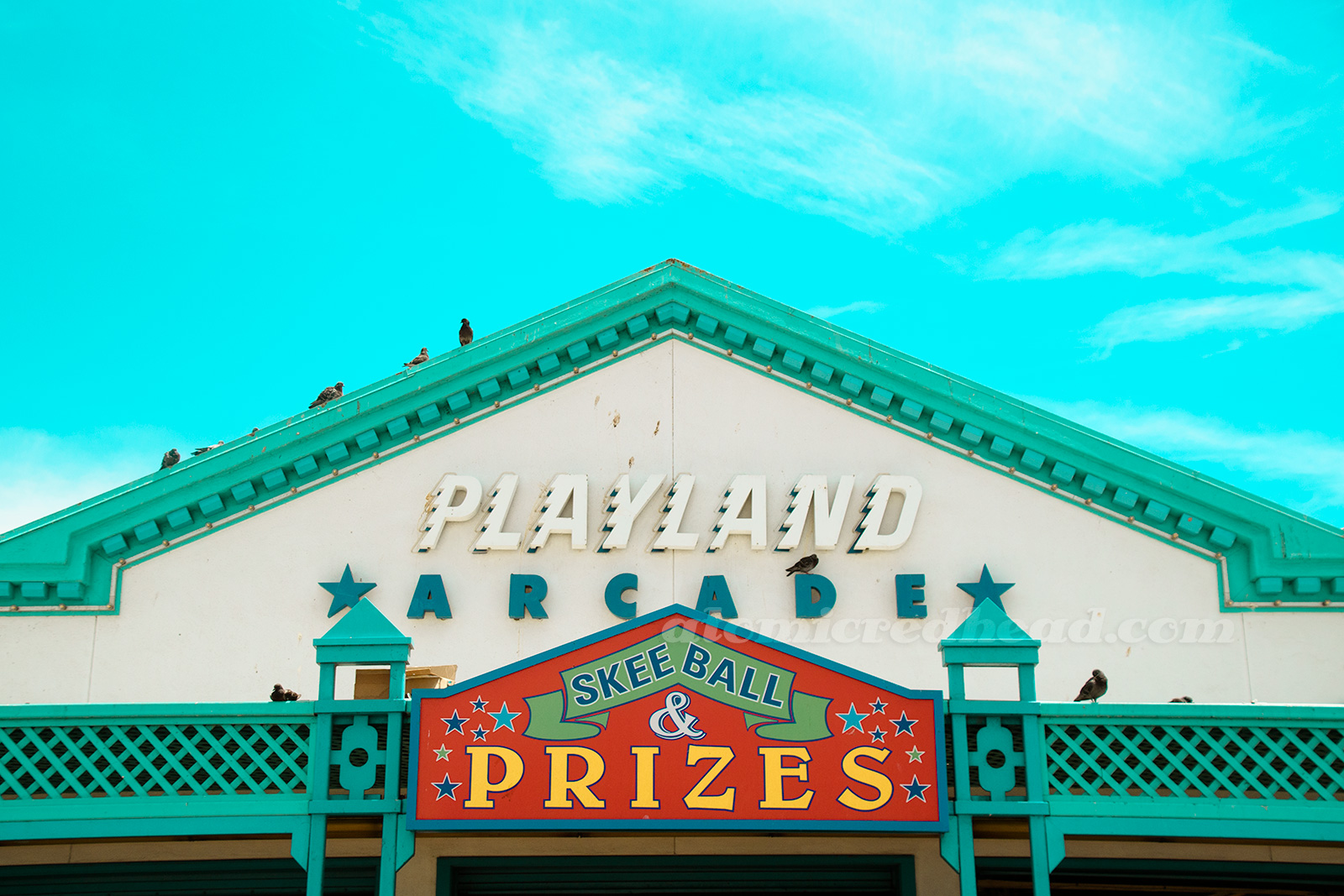 Exterior of Playland, a blue and white building.