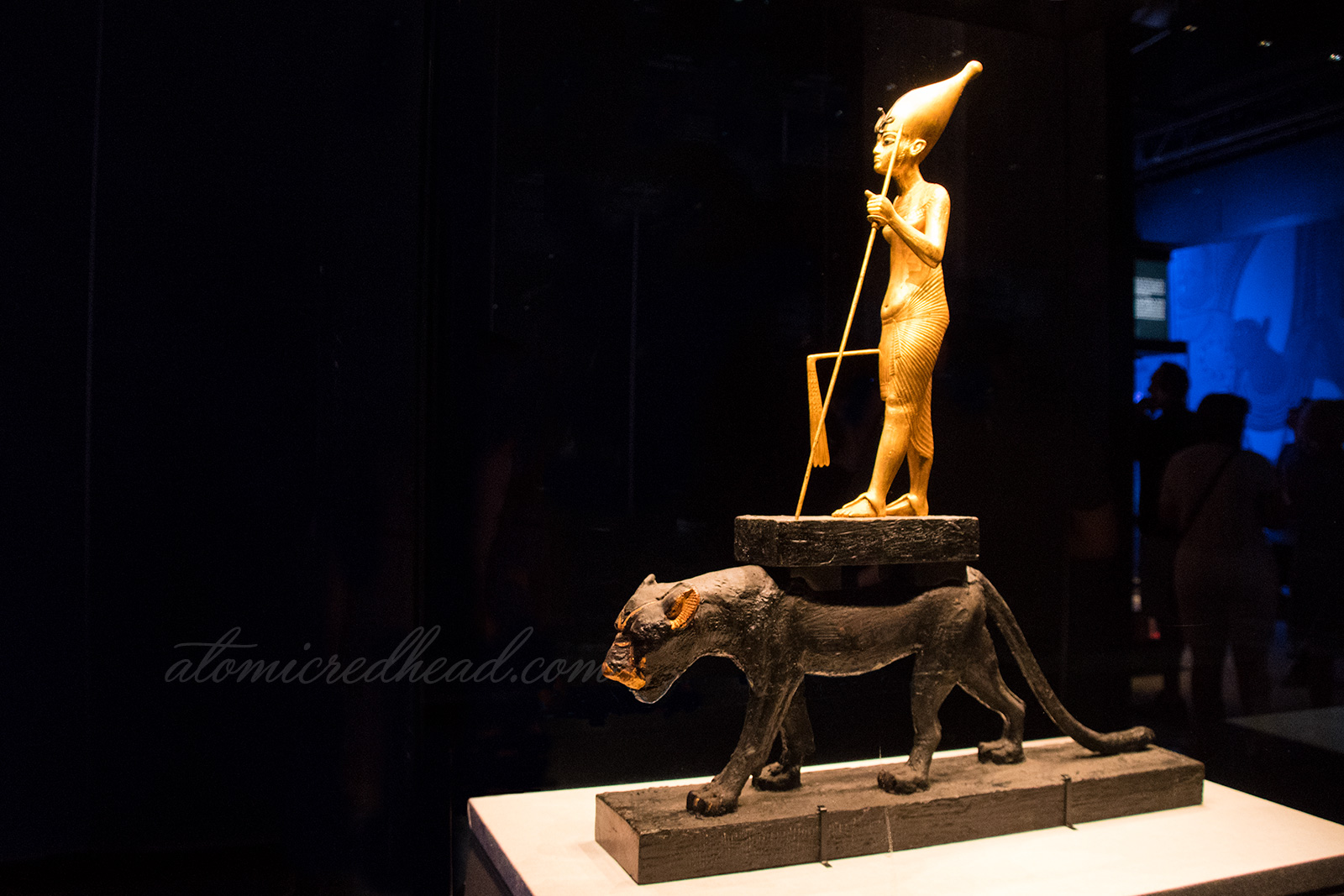 A statue of Tut atop a panther.