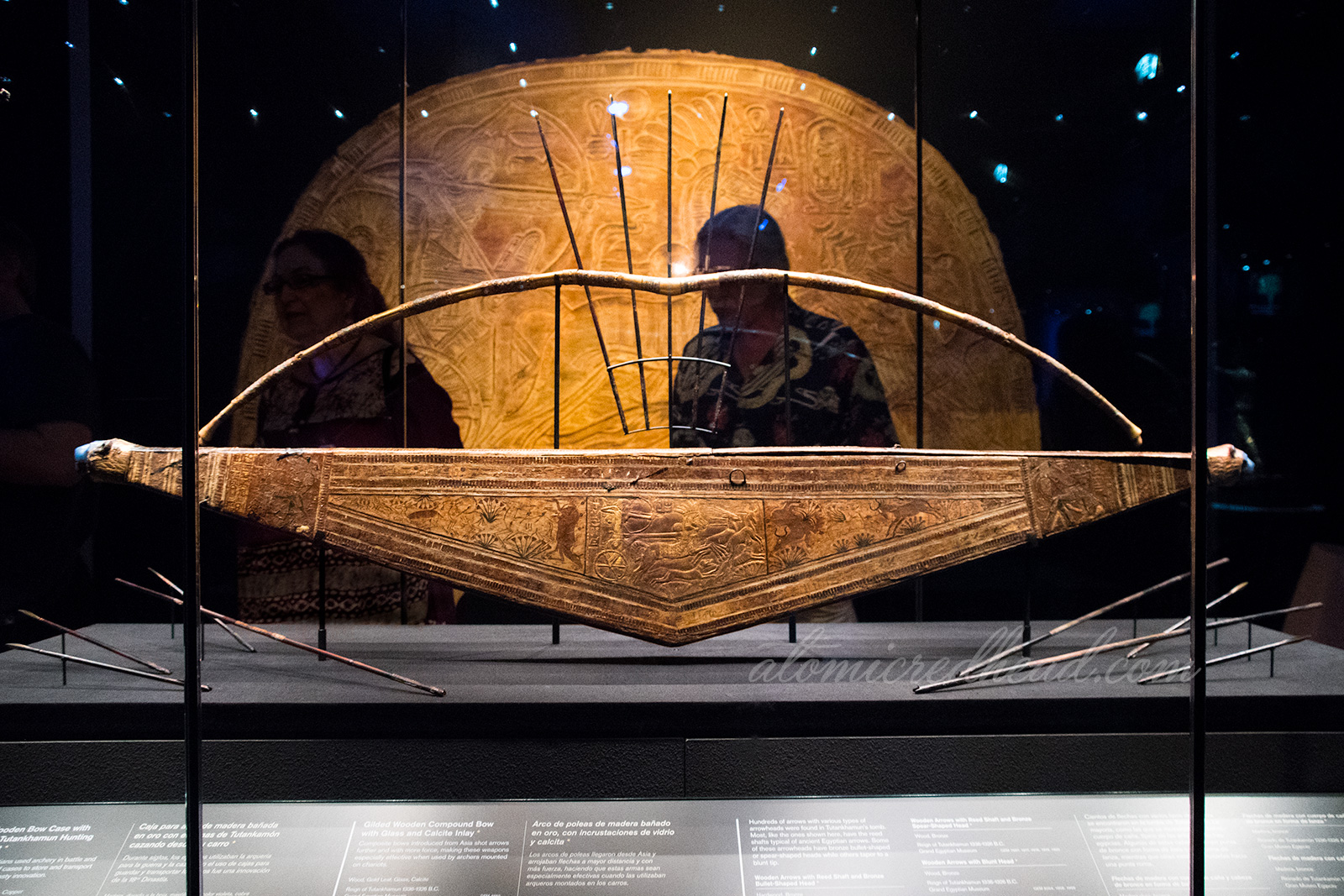 An elaborate box for storing a bow. The box features images of Tut hunting.