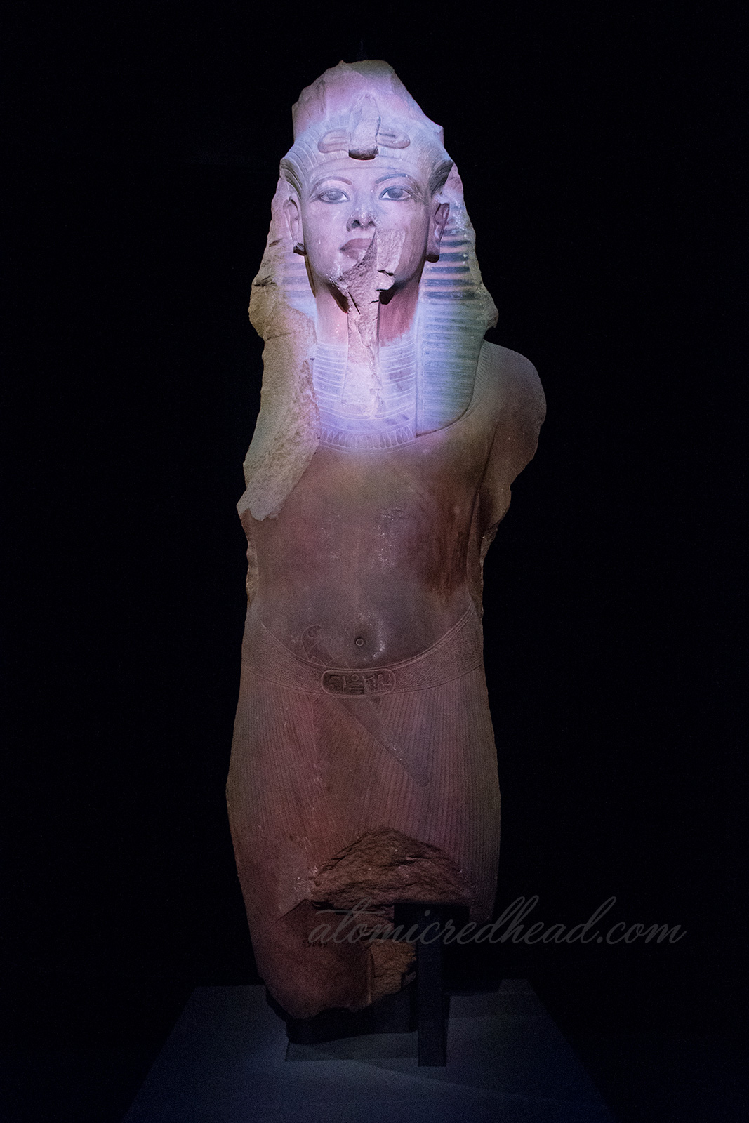 A portion of a large statue of Tut