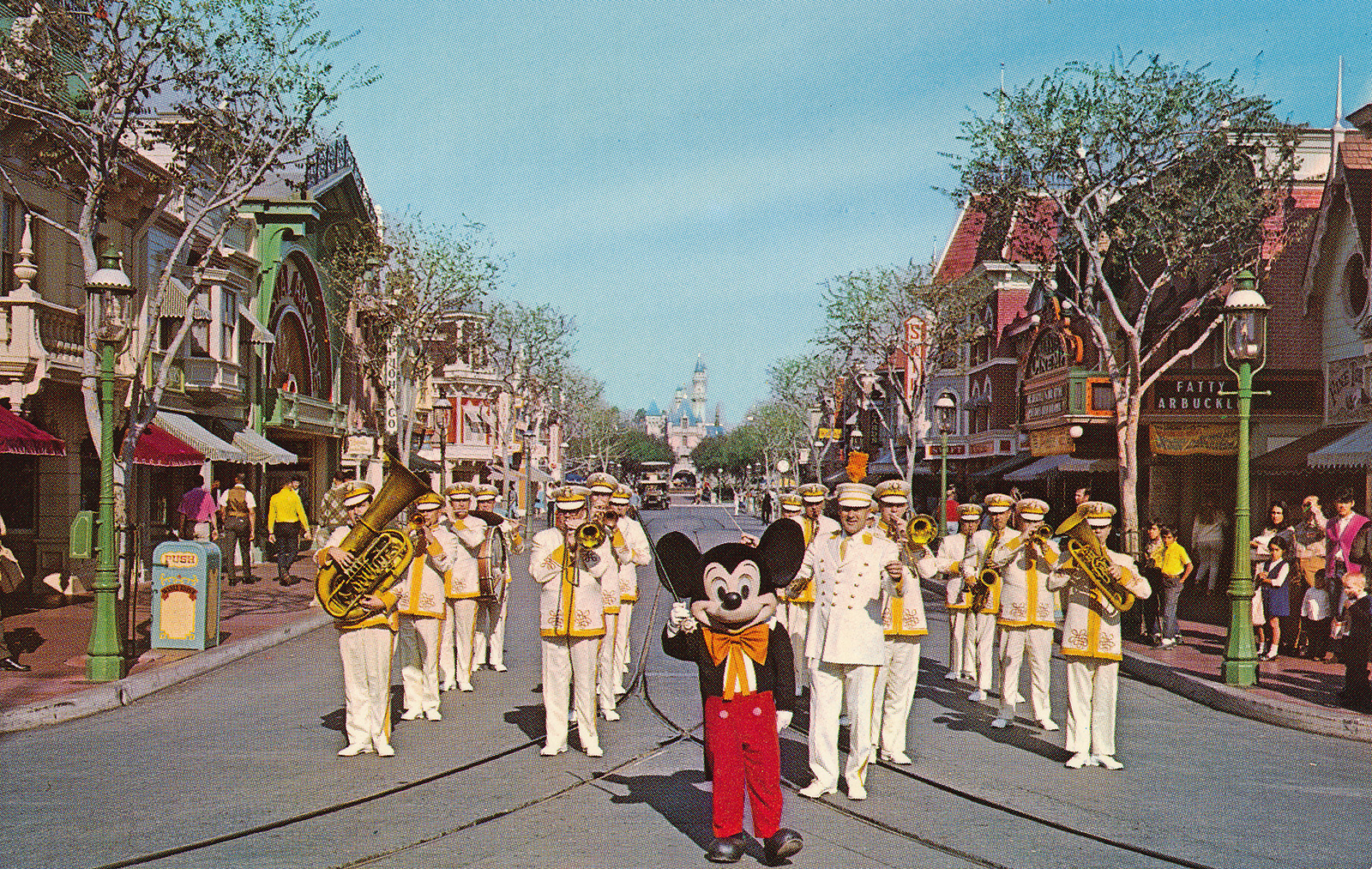 Mickey Mouse leads the Disneyland Band down Main Street.