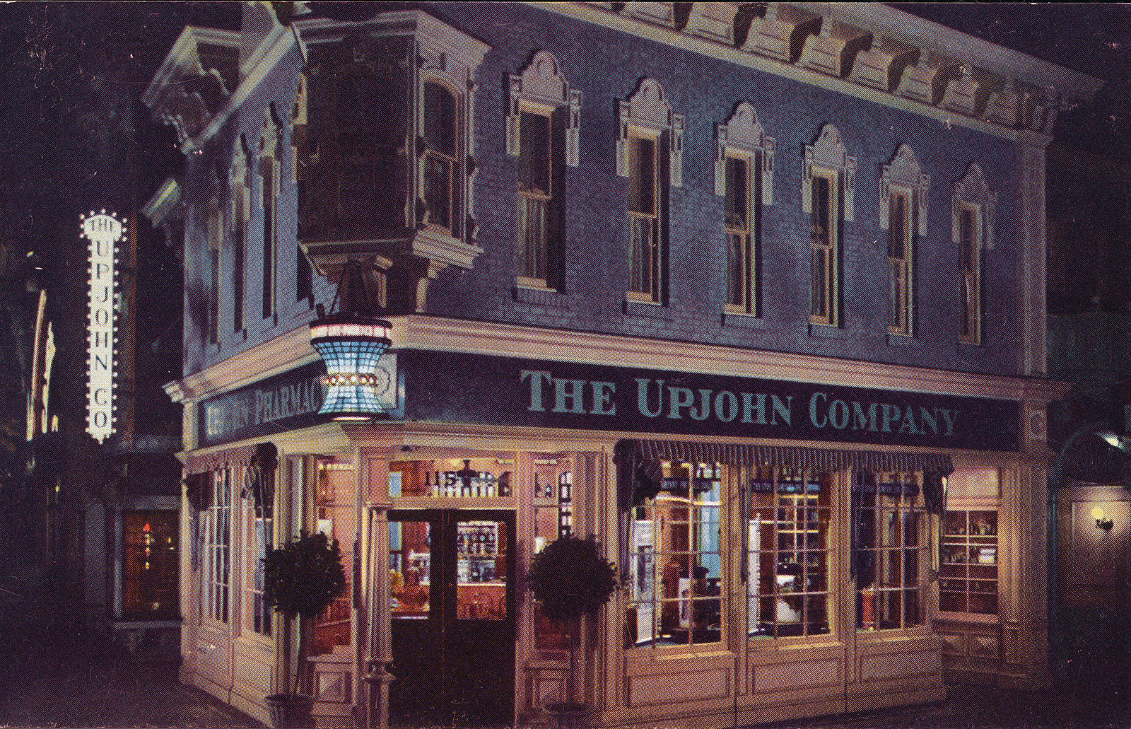 The Upjohn Pharmacy that used to be along Main Street. A blue and white building with a large stained glass mortar and pestle lamp.