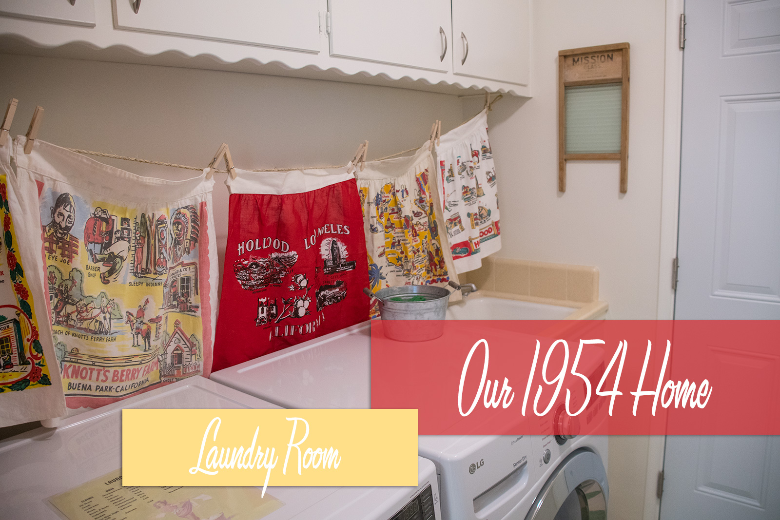 Our 1954 Home: Laundry Room text over a look at the vintage aprons that hang above the washer and dryer. A vintage washboard hangs above the sink in the back.