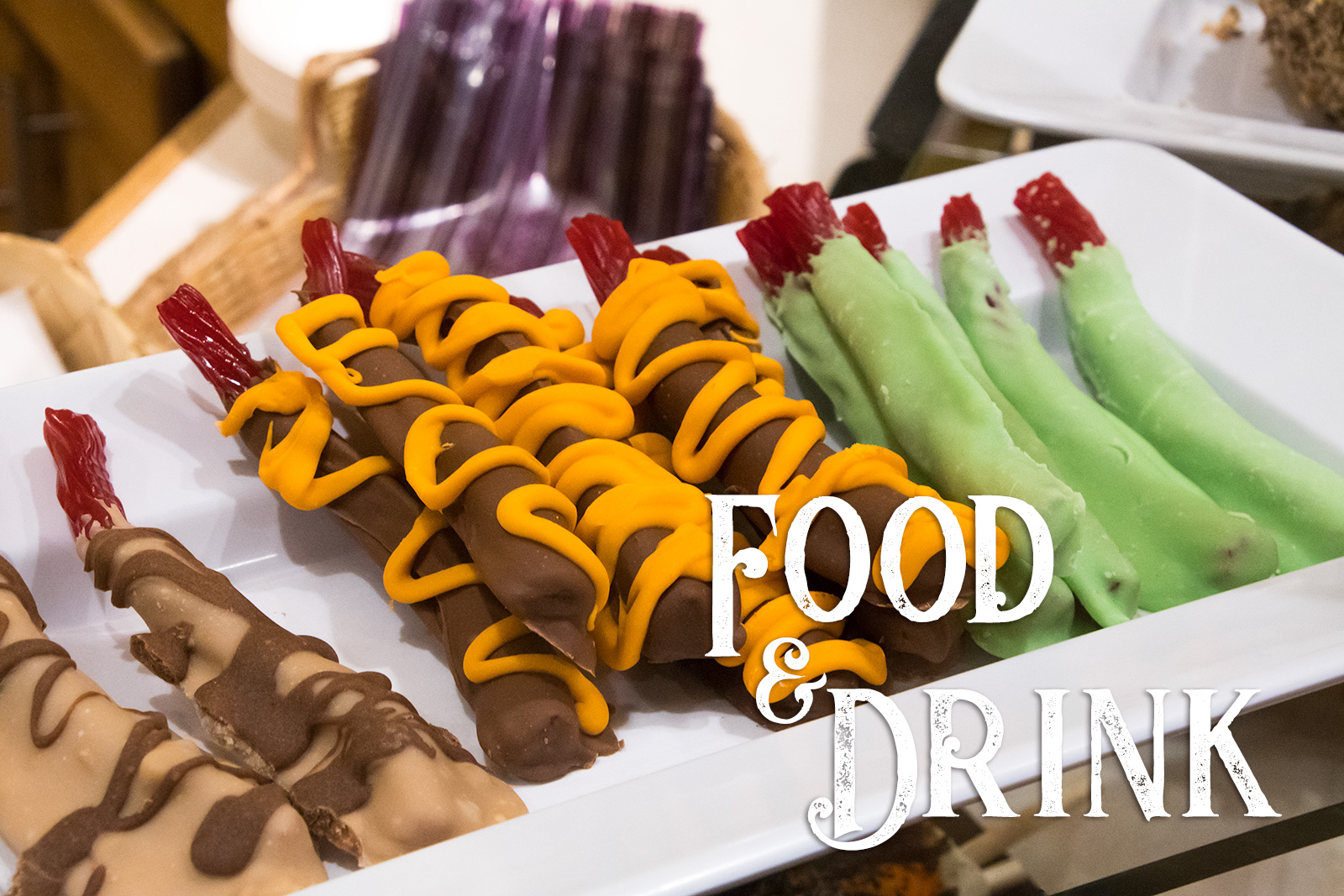 Food & Drink - Chocolate covered licorice, including one dipped in green chocolate so it looks like a witch's finger with the red bit of the licorice sticking out.