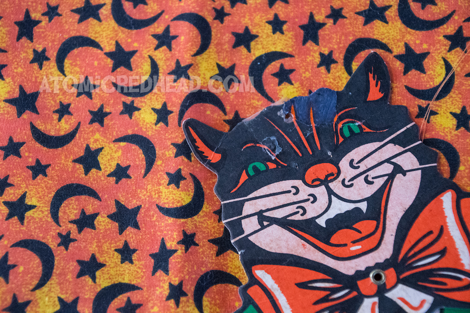 Close-up of a torn area that has been touched up with marker.