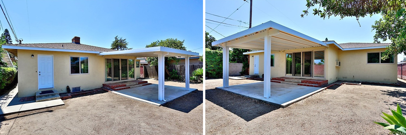 A covered patio extends out of the house into a dirt lot.