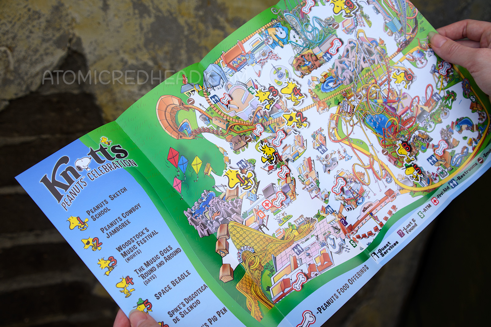 The map of Knott's Berry Farm featuring little Woodstocks showing Guests where special Peanuts Celebration offerings are.