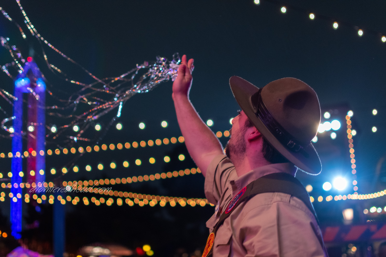 Justin Credible, tosses streamers into the crowd.