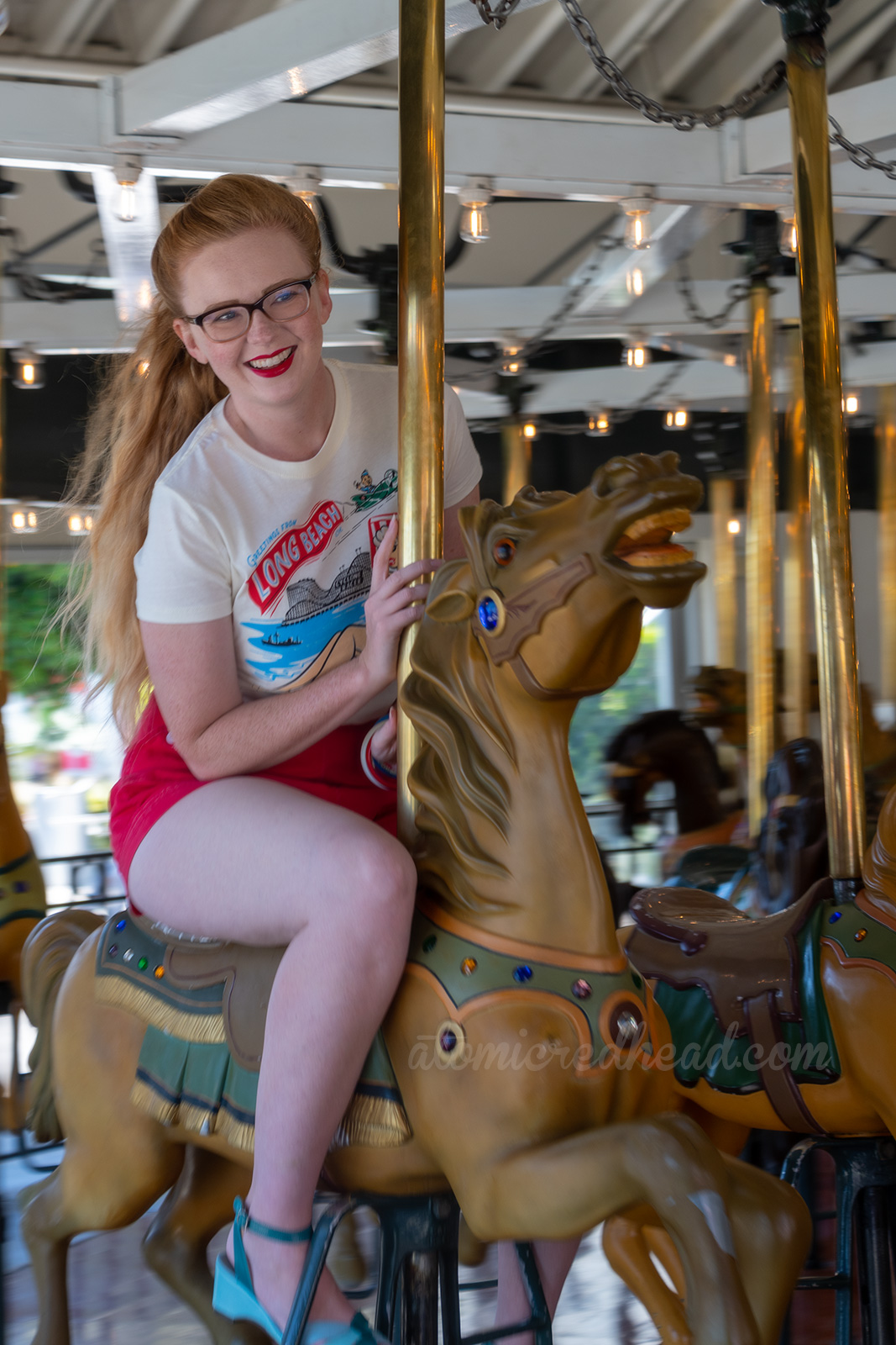 Myself riding one of the carousel horses.