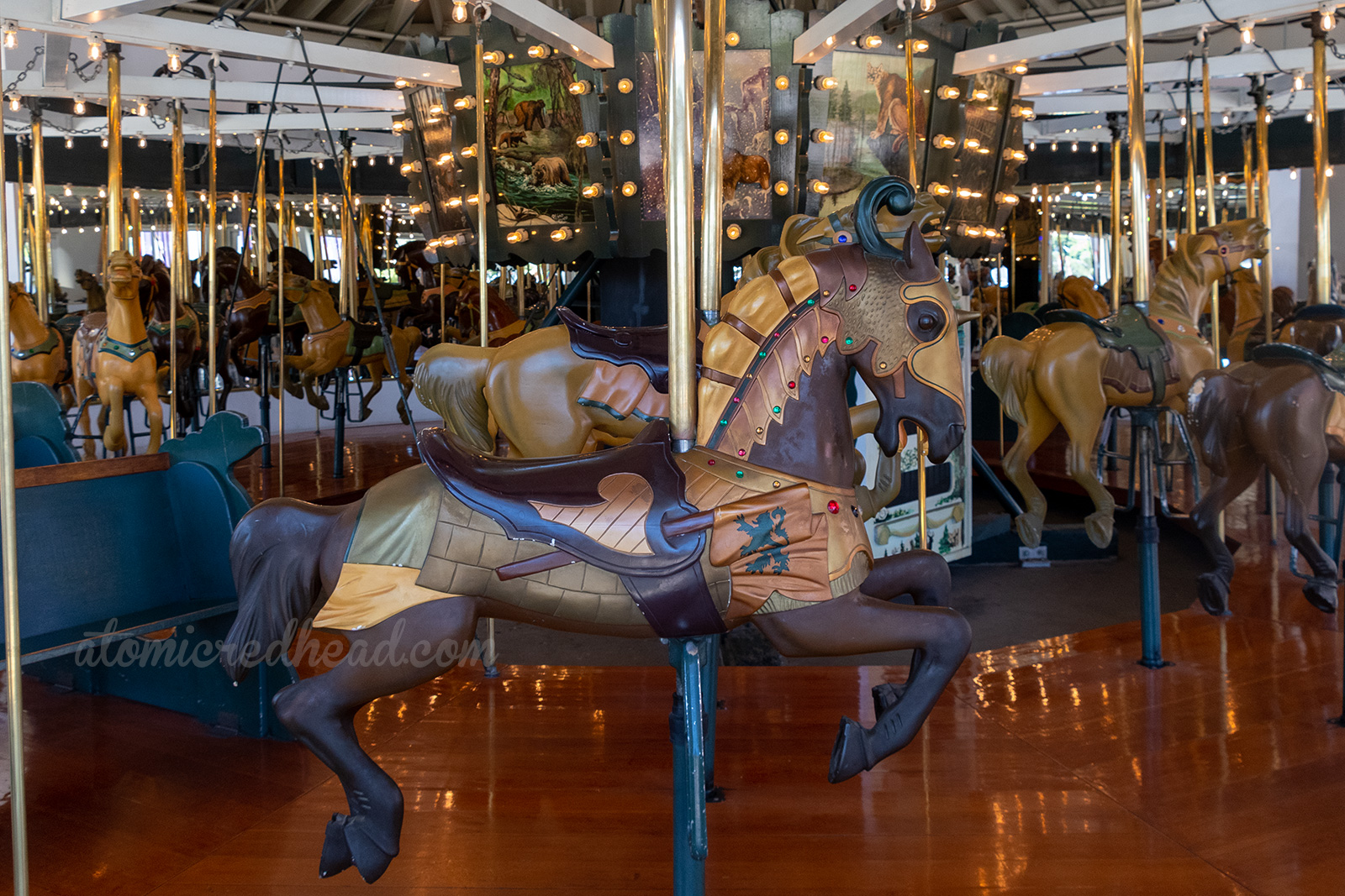 A detailed dark horse on the carousel.