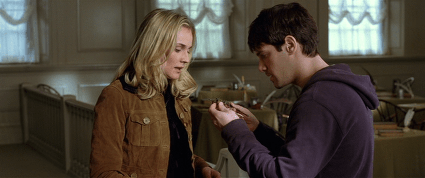 National Treasure Screencap: Abigail and Riley look at an odd pair of glasses inside the signing room of Independence Hall. 