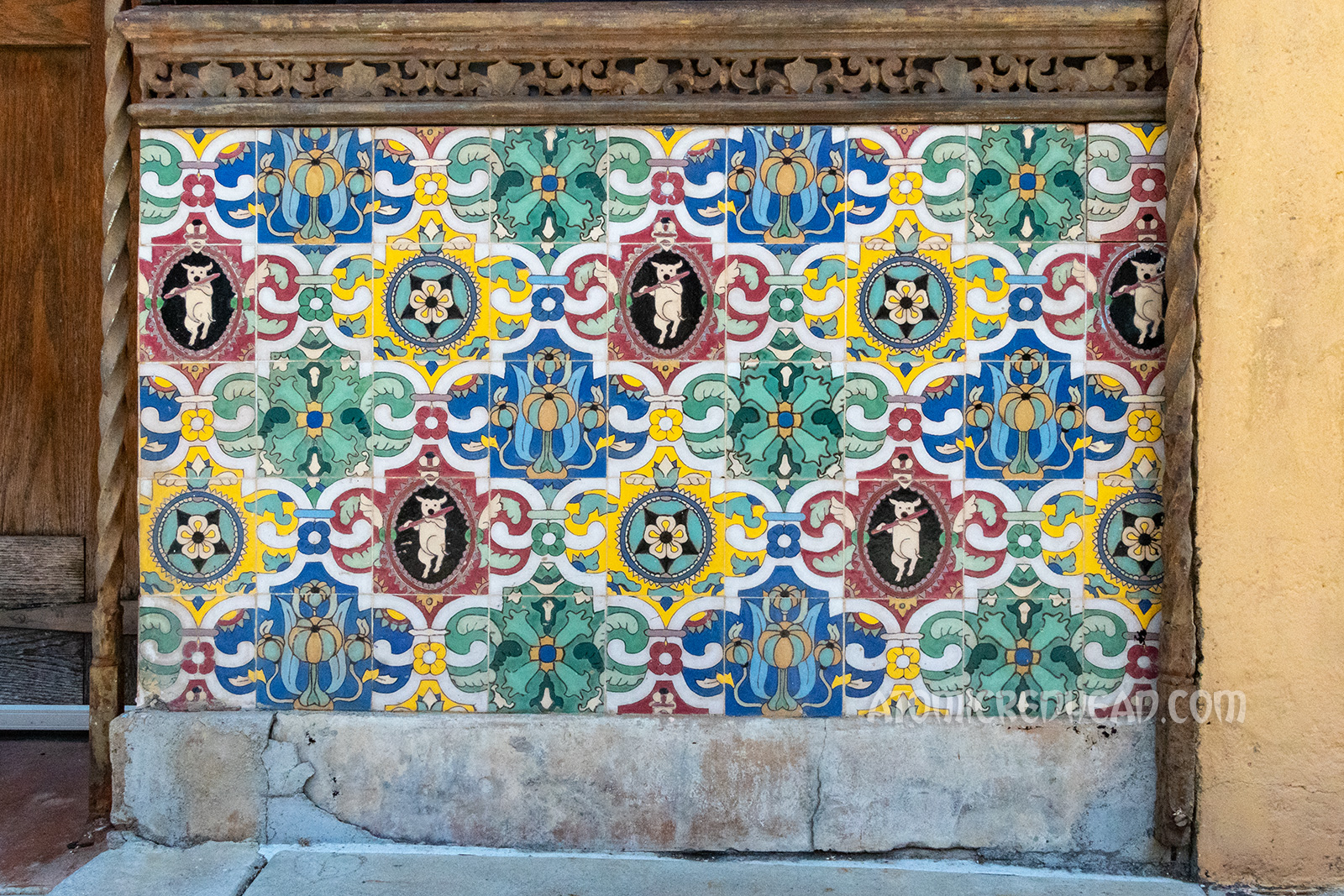 Close-up of the Pig n Whistle tile, which feature images of pigs with flutes.