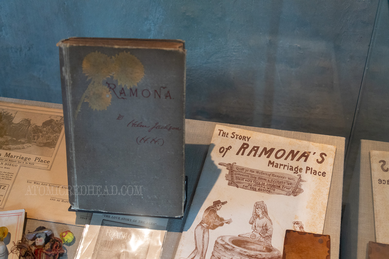 An early copy of Ramona, along with ephemera from the early times when the casa was "Ramona's Marriage Place"