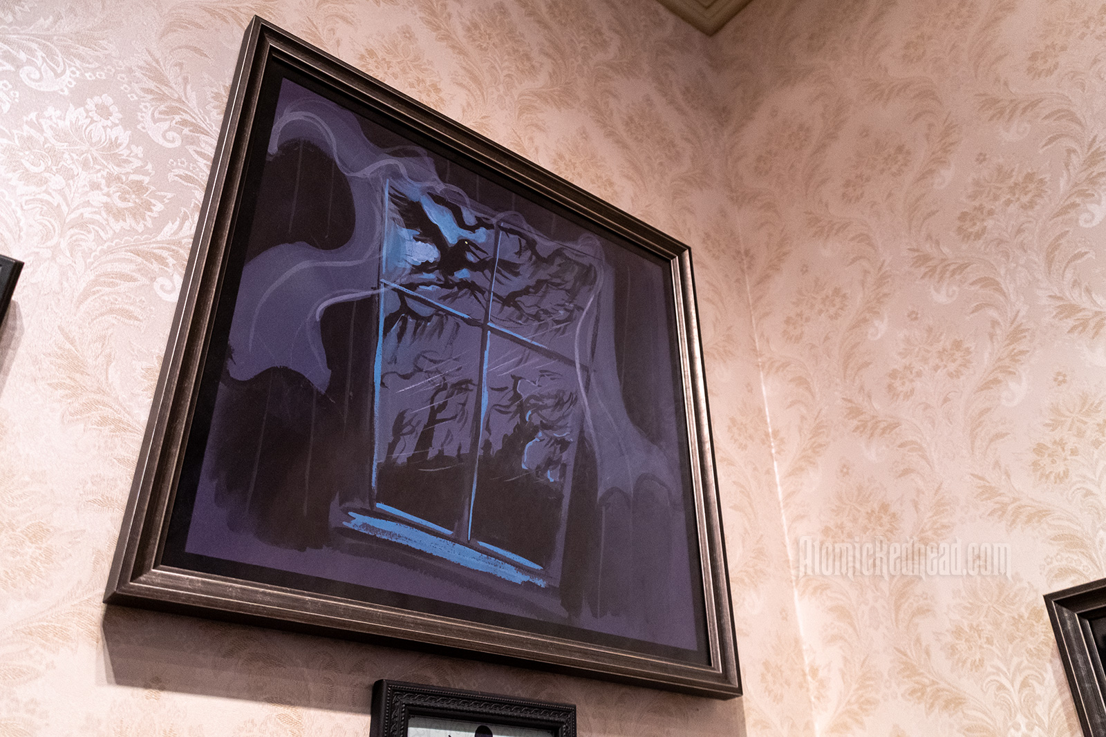 An illustration of a raven outside a window with dark trees behind.