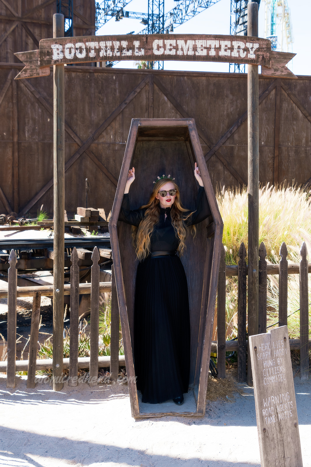 Myself standing inside the casket at the Boot Hill Cemetery.