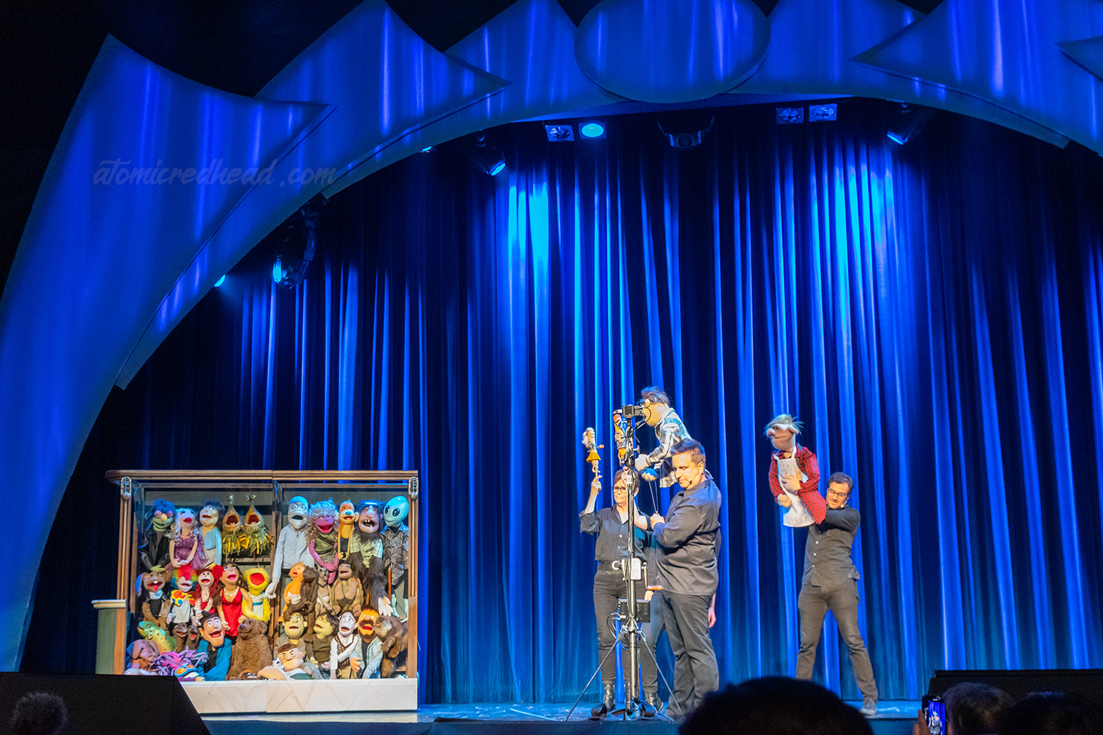 The puppeteers of Puppet Up work their magic on stage.