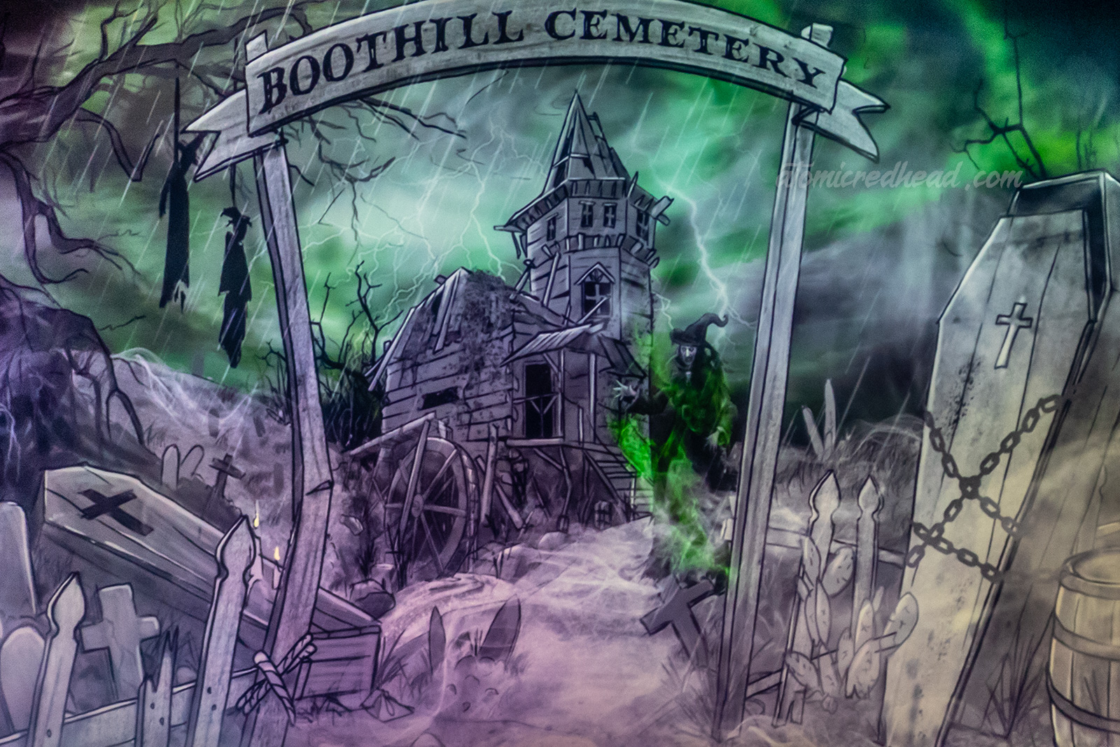 Concept art for the new maze, Origins, which features a run down haunted house just beyond the Boot Hill Cemetery, on the left bodies hang from a tree, emerging from the fog is a witch.