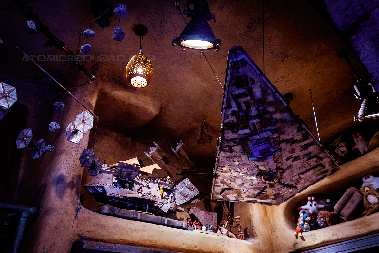 A toy Star Destroyer hangs in the toy shop of Galaxy's Edge.