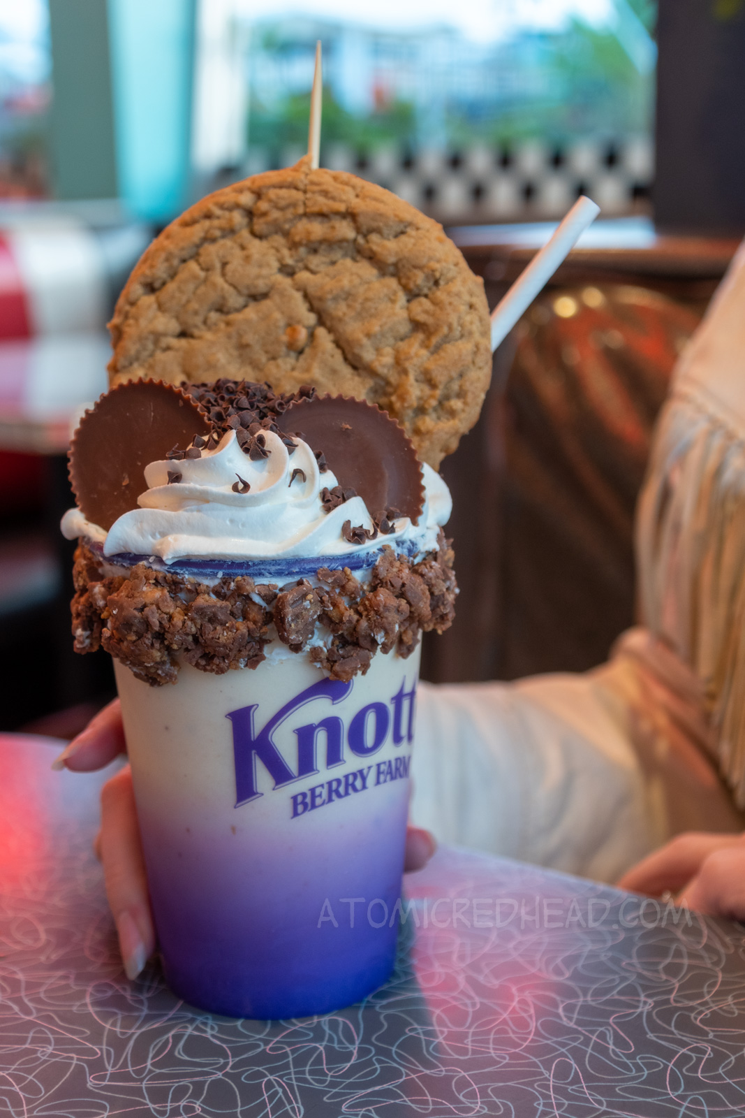 The Everything Peanut shake, which is topped with whipped cream, peanut butter cups, and a peanut butter cookie.