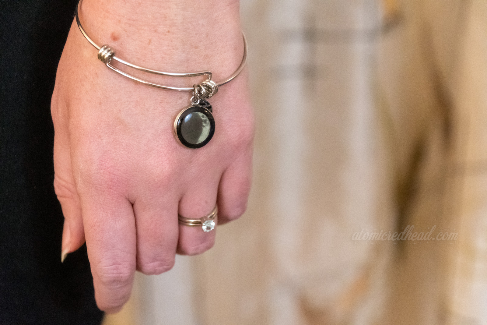 Close-up of the Moon Phase bracelet on my hand.