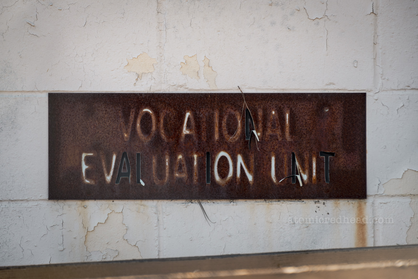 A fading sign reads "Vocational Evaluation Unit"