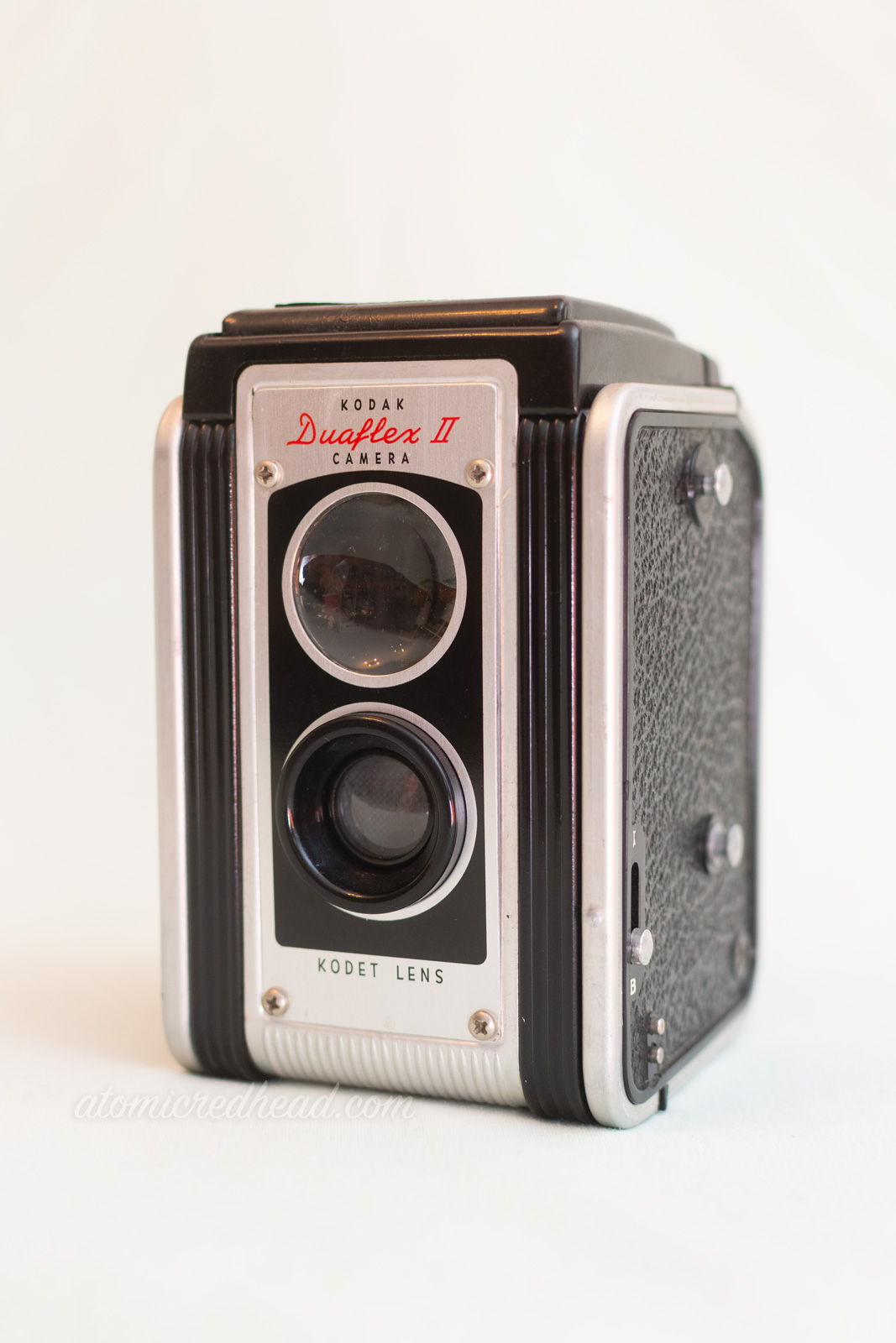 Kodak Duaflex II. A silver and black dual lens camera. Red script at the top reads "Duaflex II"