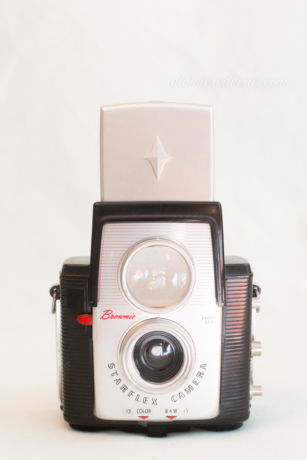 Kodak Brownie Starflex. A black and silver dual lens camera.