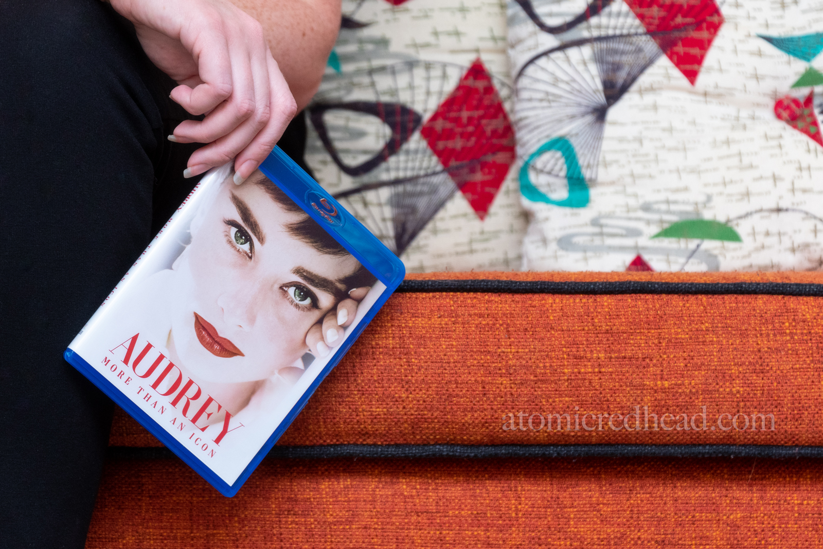 Close-up of the Blu-ray case, which features Hepburn's face and text reading "Audrey: More than an Icon."