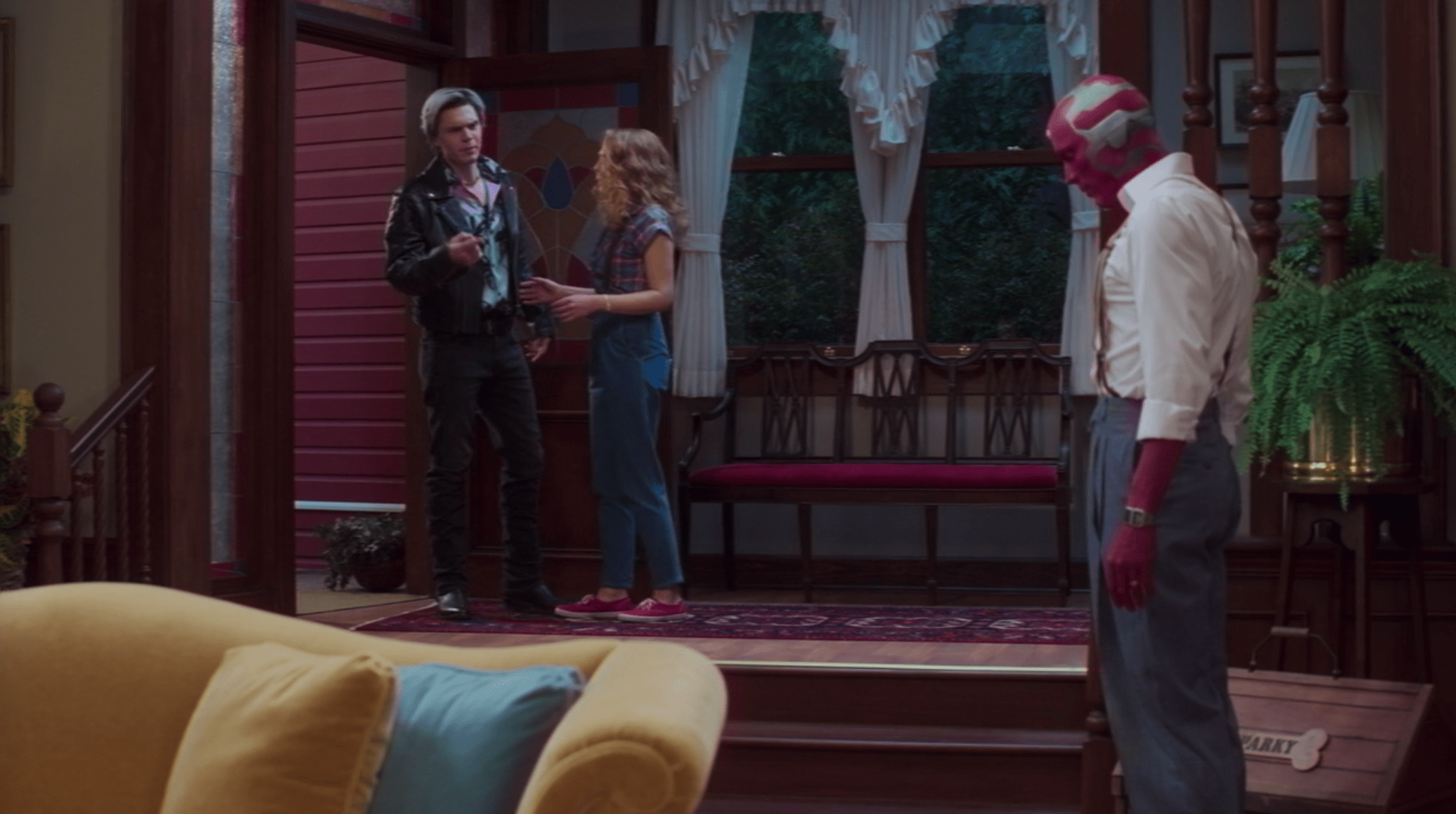 Pietro, played by Evan Peters, arrives on Wanda and Vision's doorstep, wearing a black leather motorcycle jacket, purple and teal Hawaiian shirt, and black jeans.