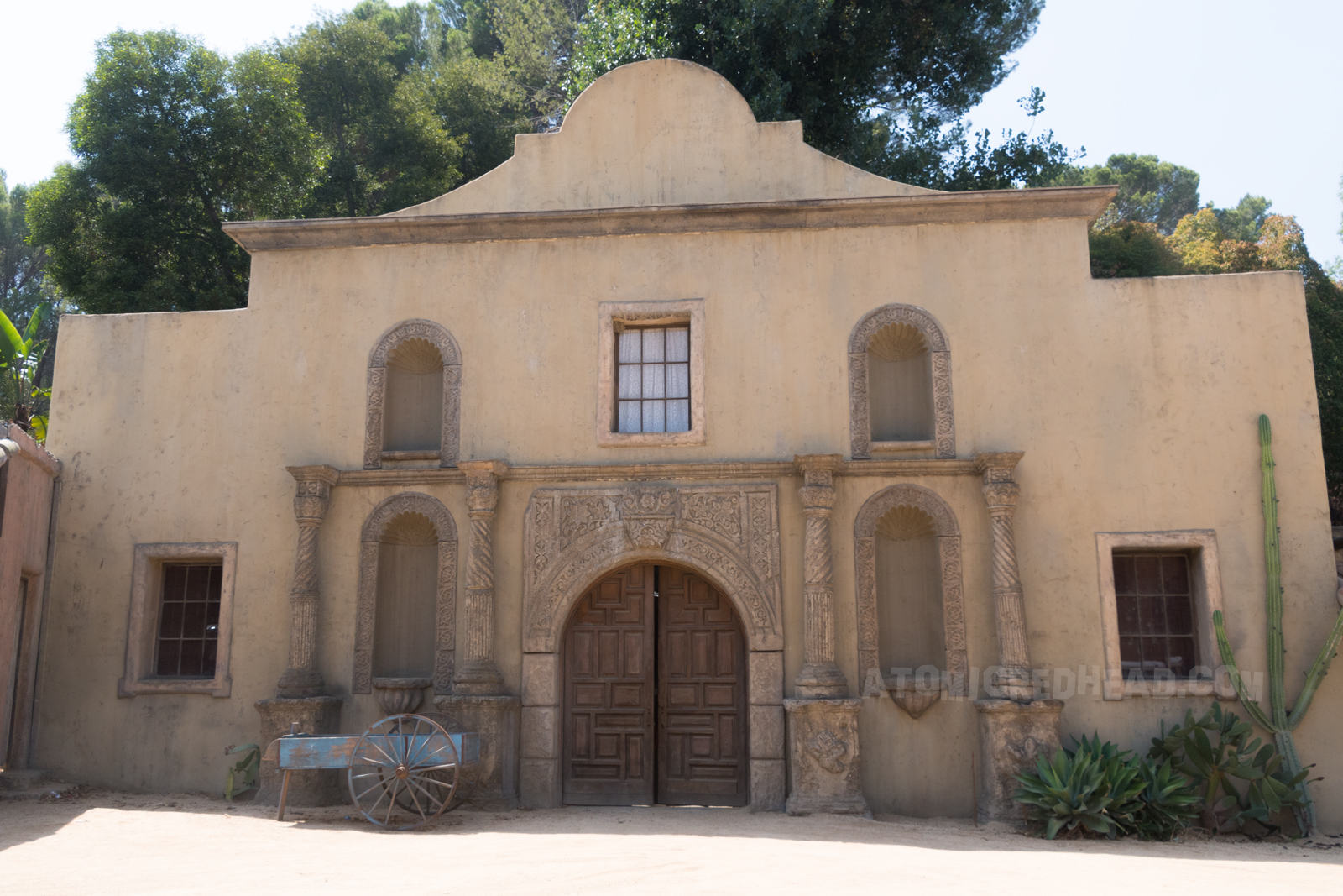 The same building, complete with little blue wagon.