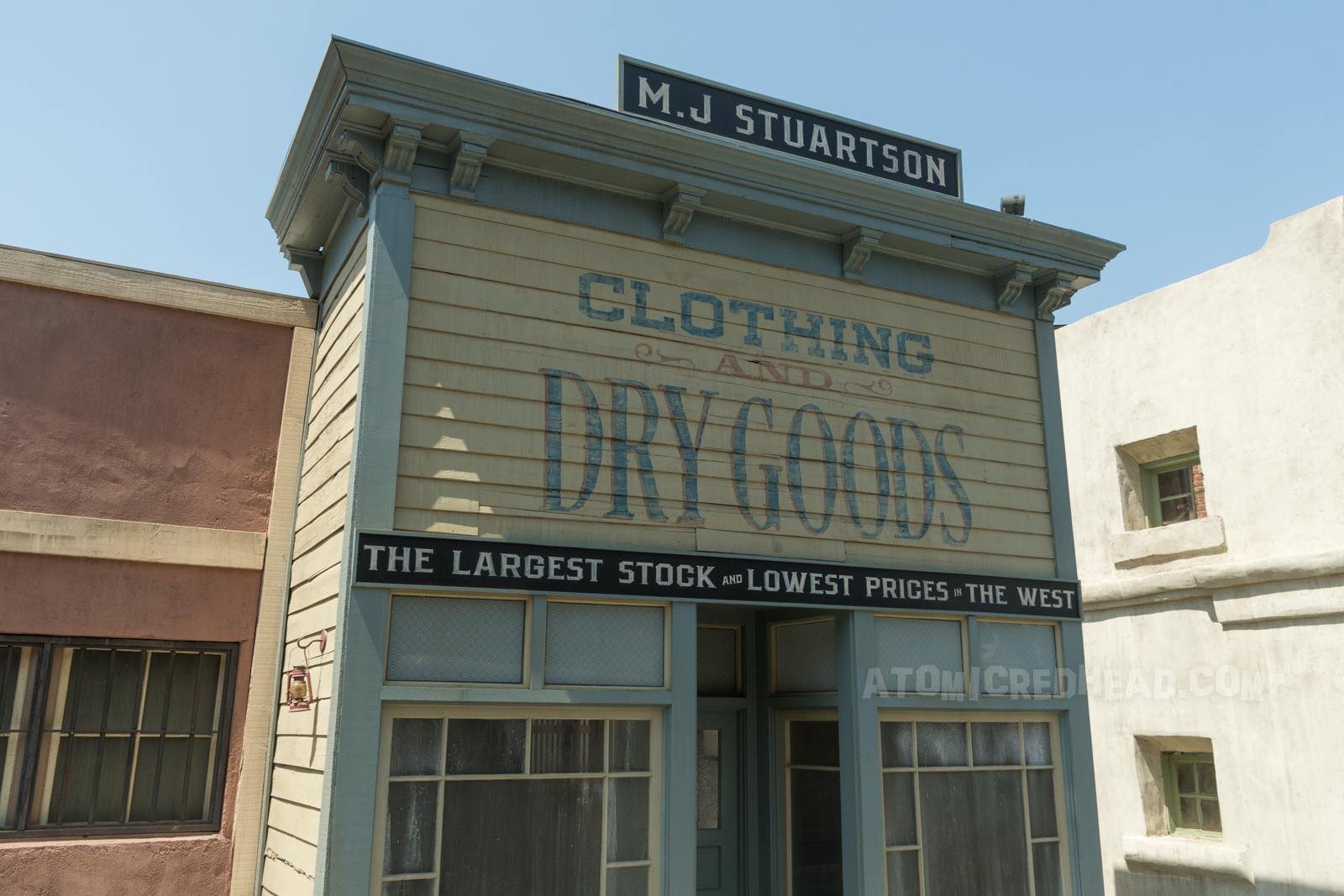 The same building on the lot, with "Dry Goods" still painted on it.