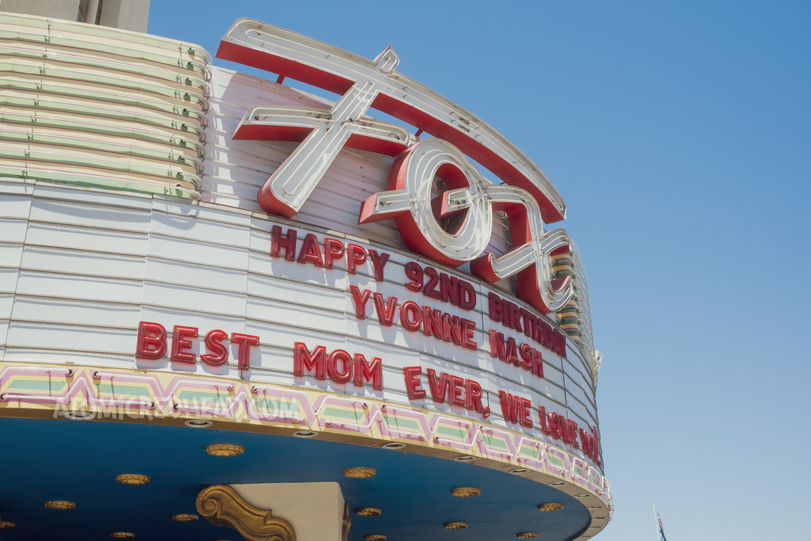 Close-up of the script reading "Fox" in neon that sits above the marque.