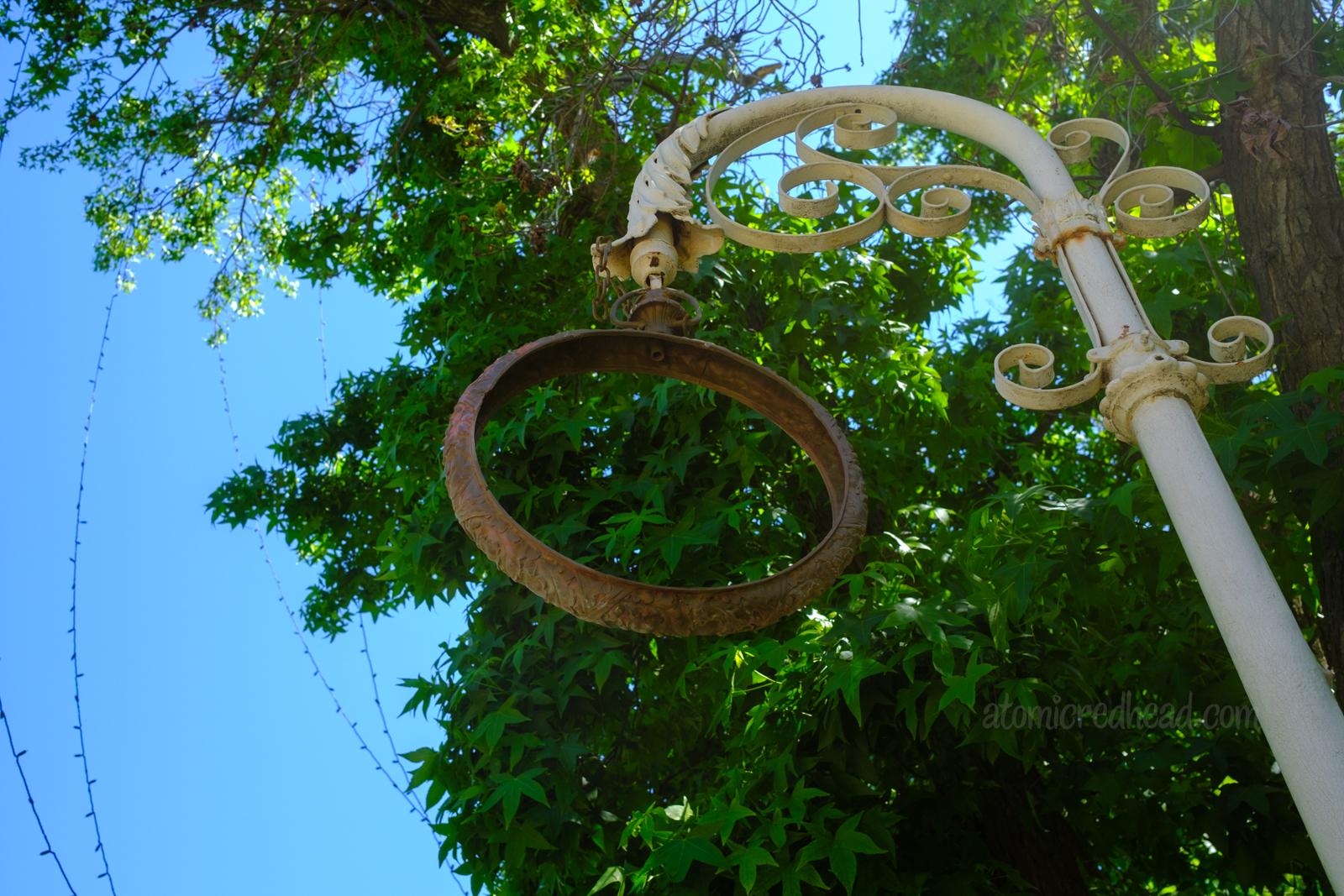 The remains of a large clock that was made to resemble a pocket watch to advertise a watch maker shop.