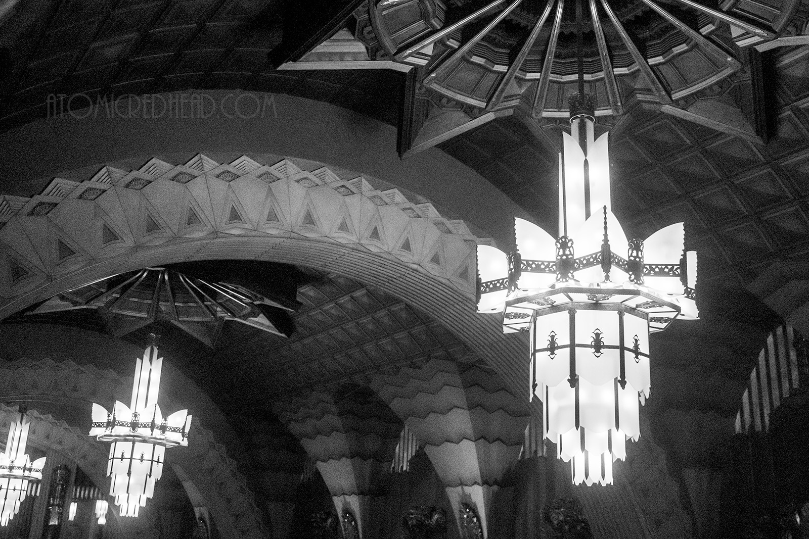 Black and white photo of one of the tiered Art Deco chandeliers.