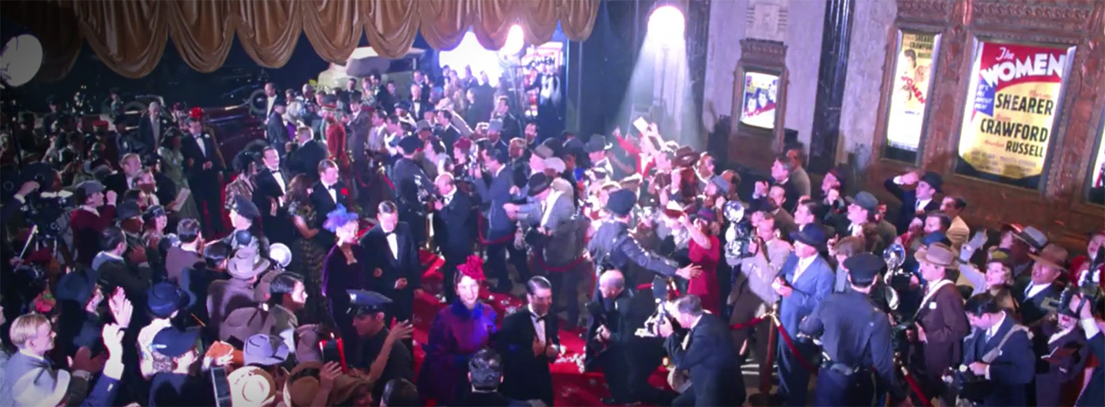Exterior entrance of the Pantages as it appears in The Aviator, a flood of people crowd as stars arrive for a movie premiere.