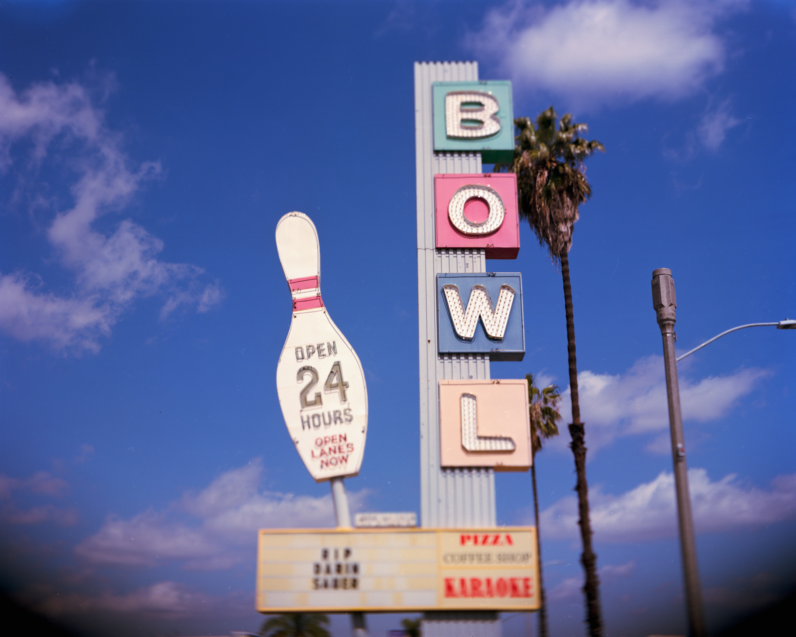 Large sign with a bowling pin.