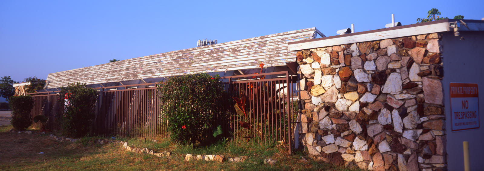 Abandoned building at sunset.