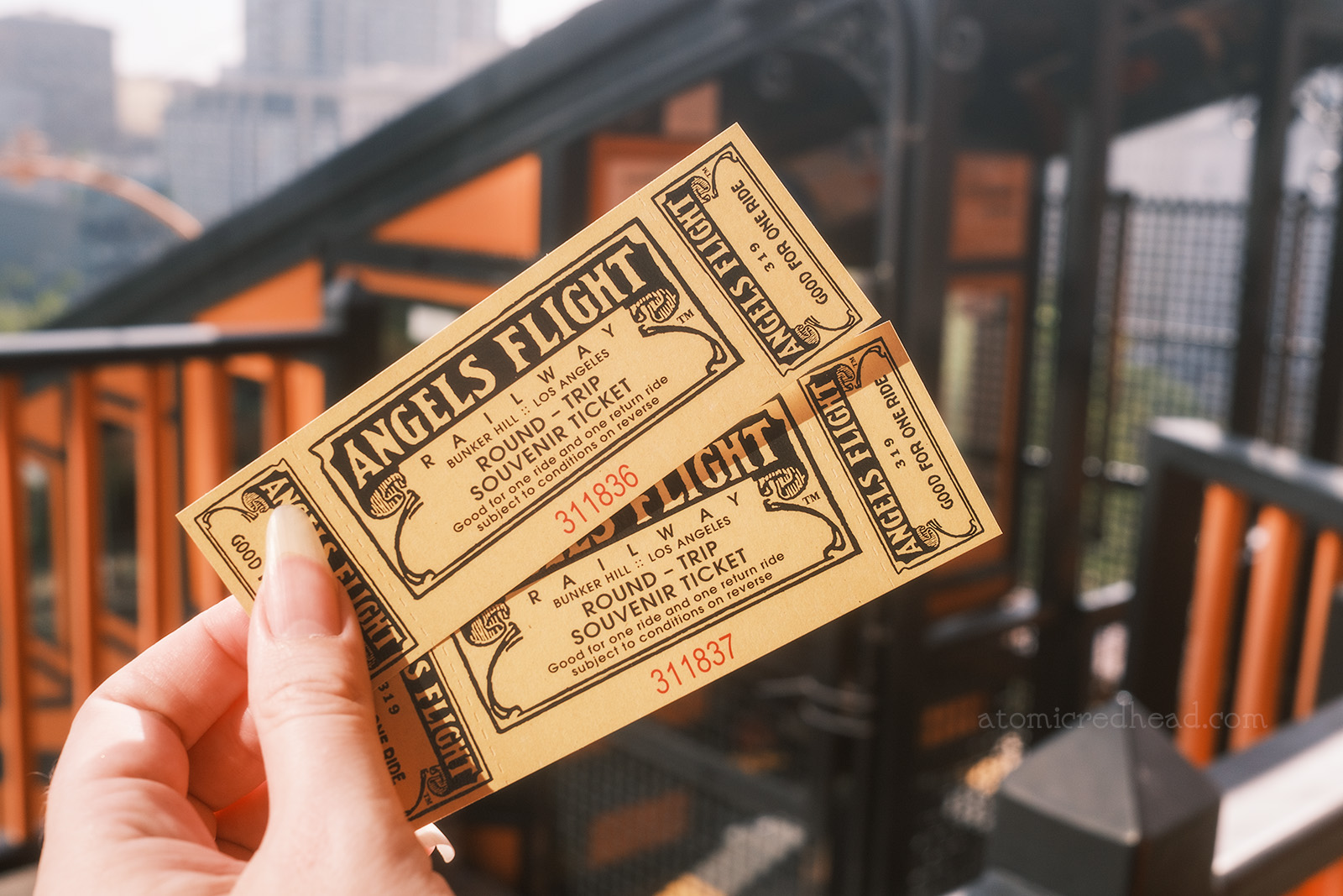 Souvenir tickets for Angels Flight, printed on yellow paper with ornate black frames.