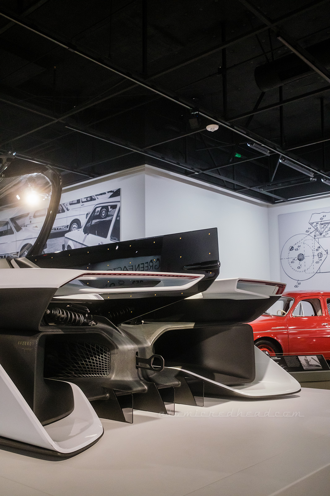 The extremely futuristic back of one of the many hypercars on display.