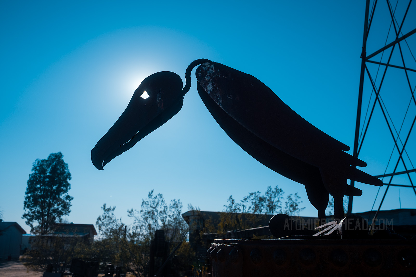 A metal sculpture of a vulture.