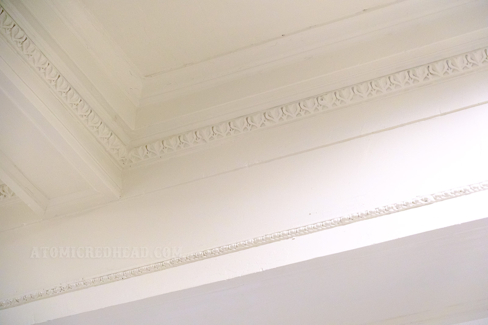 Detailed molding in the ceiling is one of the few details that remain from the elegant days of the dining room.