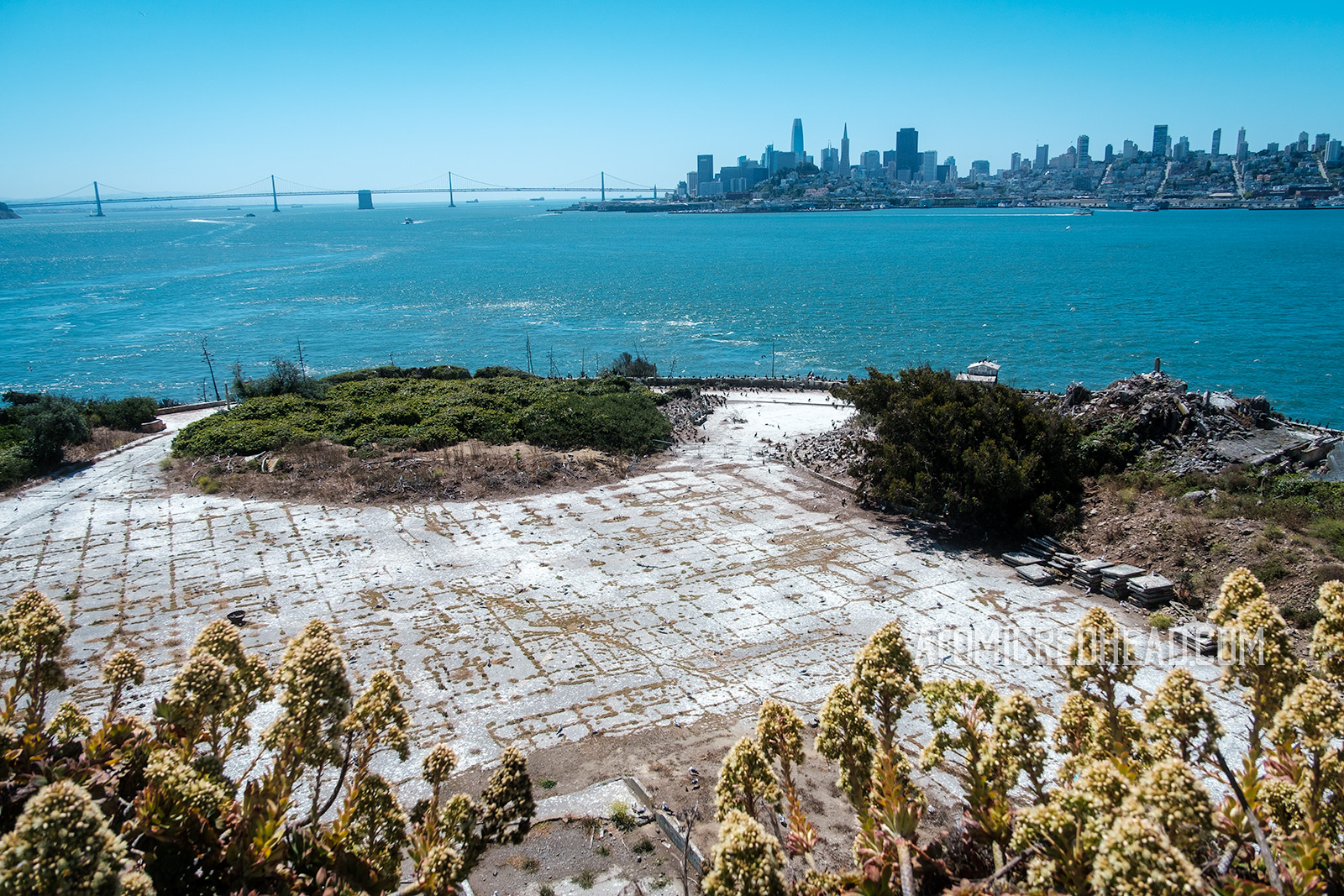 An expanse that has been leveled that used to be where the civilian homes were.