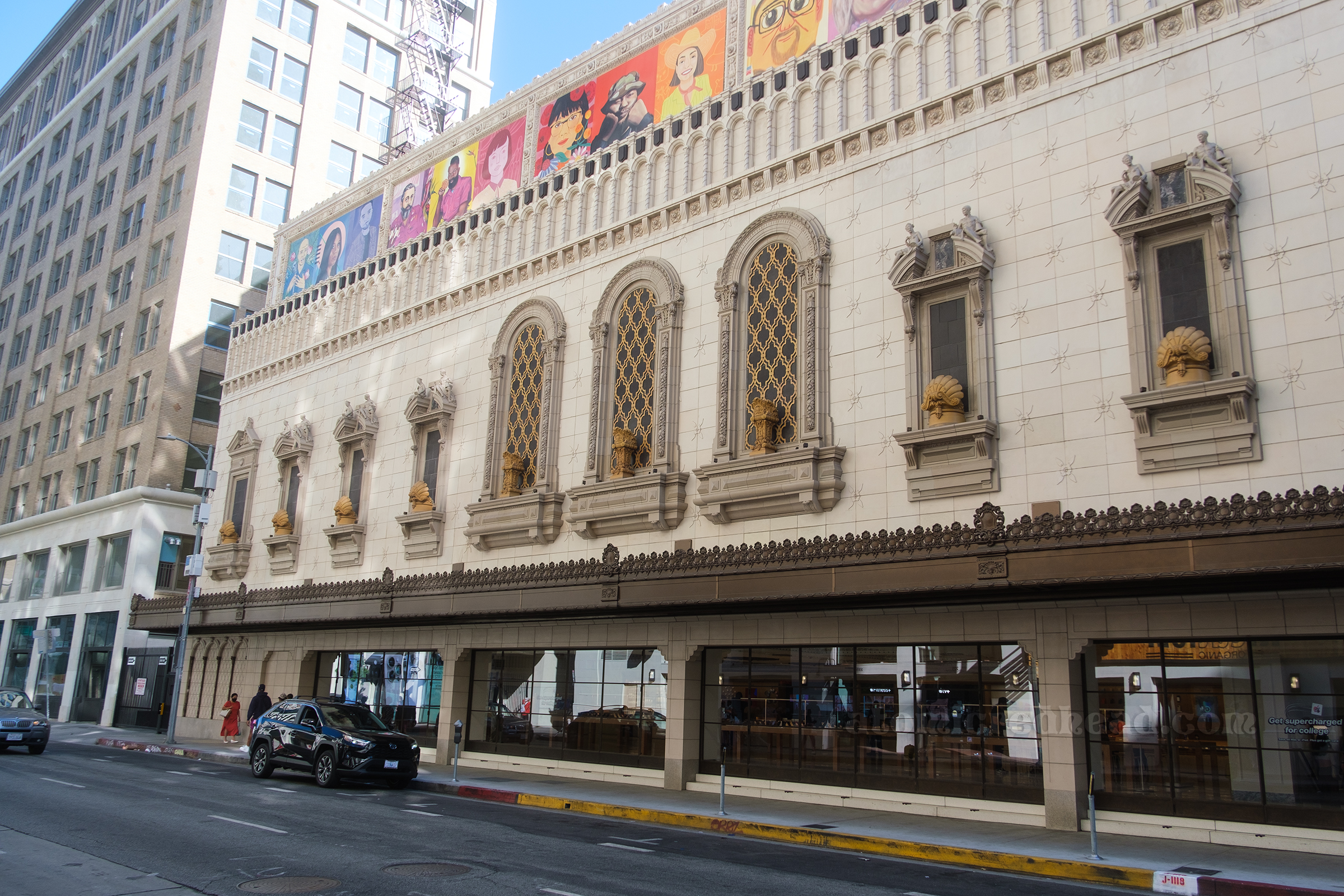 Exterior view of the side, with various arched windows.